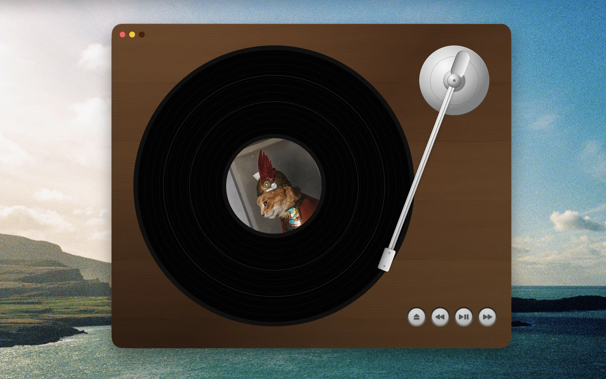Scamp Micro Deck on a Mac desktop: a walnut turntable with a black record, a silver tonearm, and a portrait of a cat in a plumed helmet on the label.